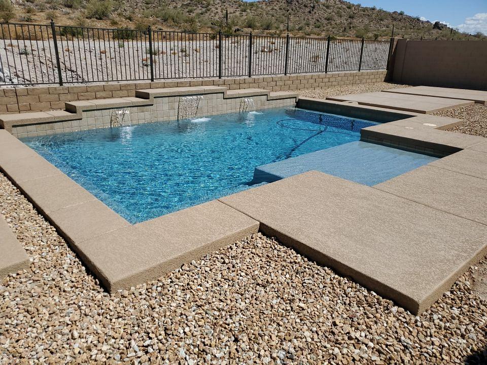 New Senoran desert pool with three fountains.